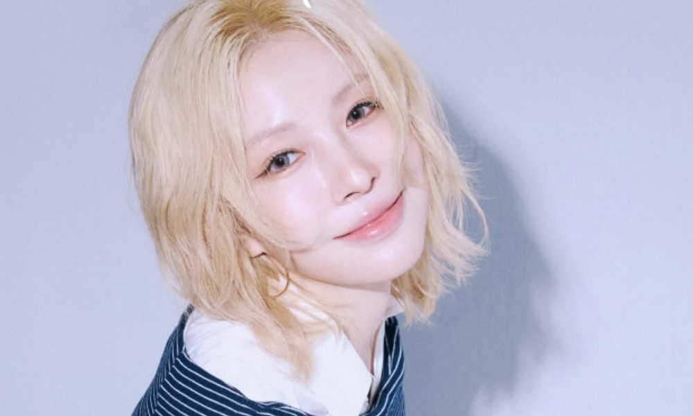 BoA transforms with curly blonde hair, her first stage after going solo